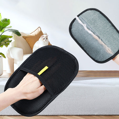 Wiping pet hair off a sofa with the mitt