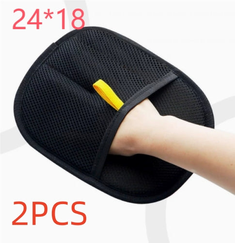 Two black mitts, 24 × 18 cm